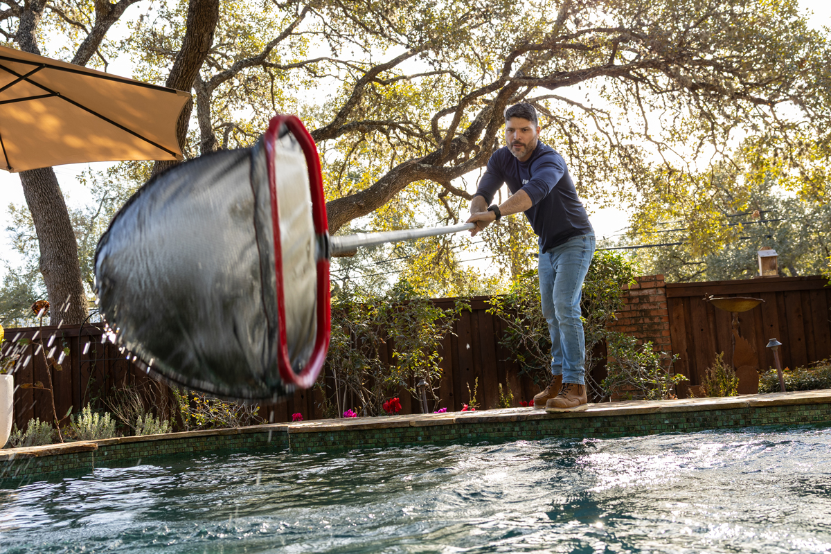 Blue Whale technician servicing a pool