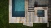 Soake plunge pool and hot tub beside a patio dining area